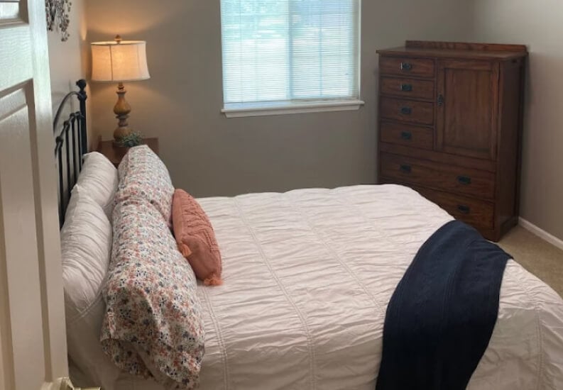 Cozy Bedroom With Natural Light at Assisted Living Community in Omaha NE Cozy Bedroom With Natural Light at Assisted Living Community in Omaha NE