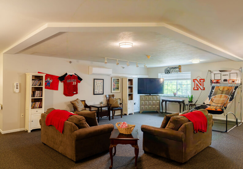 Recreation Room With Seating and TV at Assisted Living Facility in Omaha NE Recreation Room With Seating and TV at Assisted Living Facility in Omaha NE