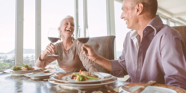 Elderly Couple Enjoying Fine Dining at Assisted Living Facility