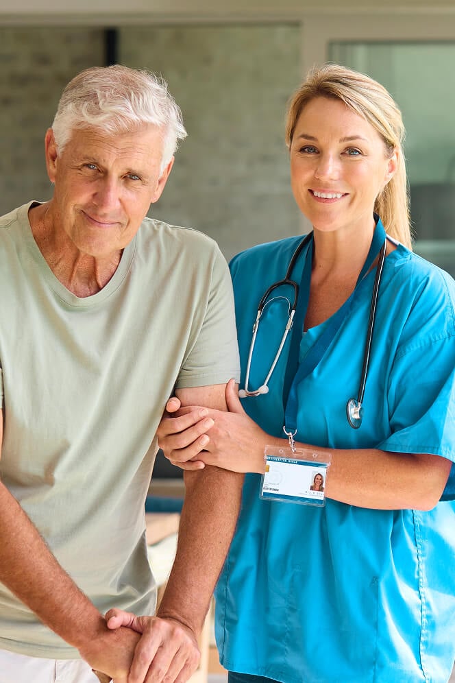 Nurse Comforting Elderly Woman at Nursing Home Colleyville
